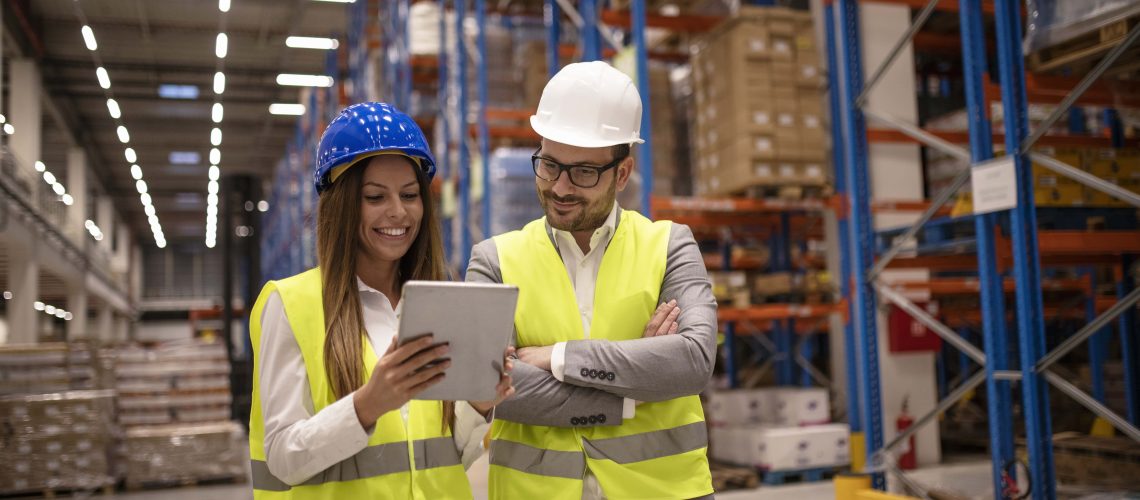 managers-controlling-distribution-checking-inventory-warehouse-storage-min